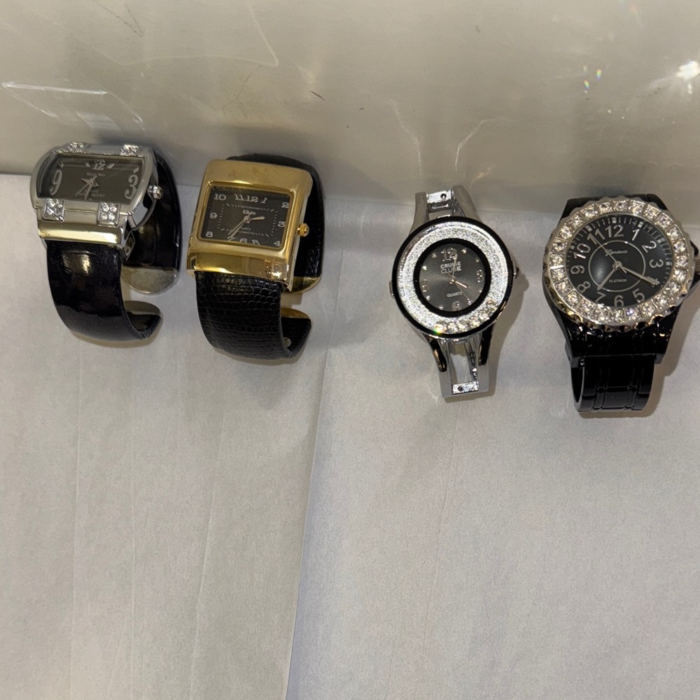 Elegant Black and Silver Watches Set. Set of 4